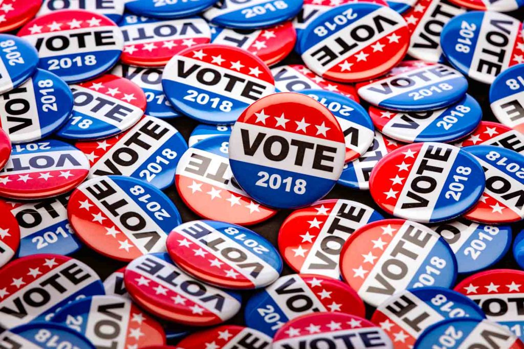 Image of Democratic vote pins.
